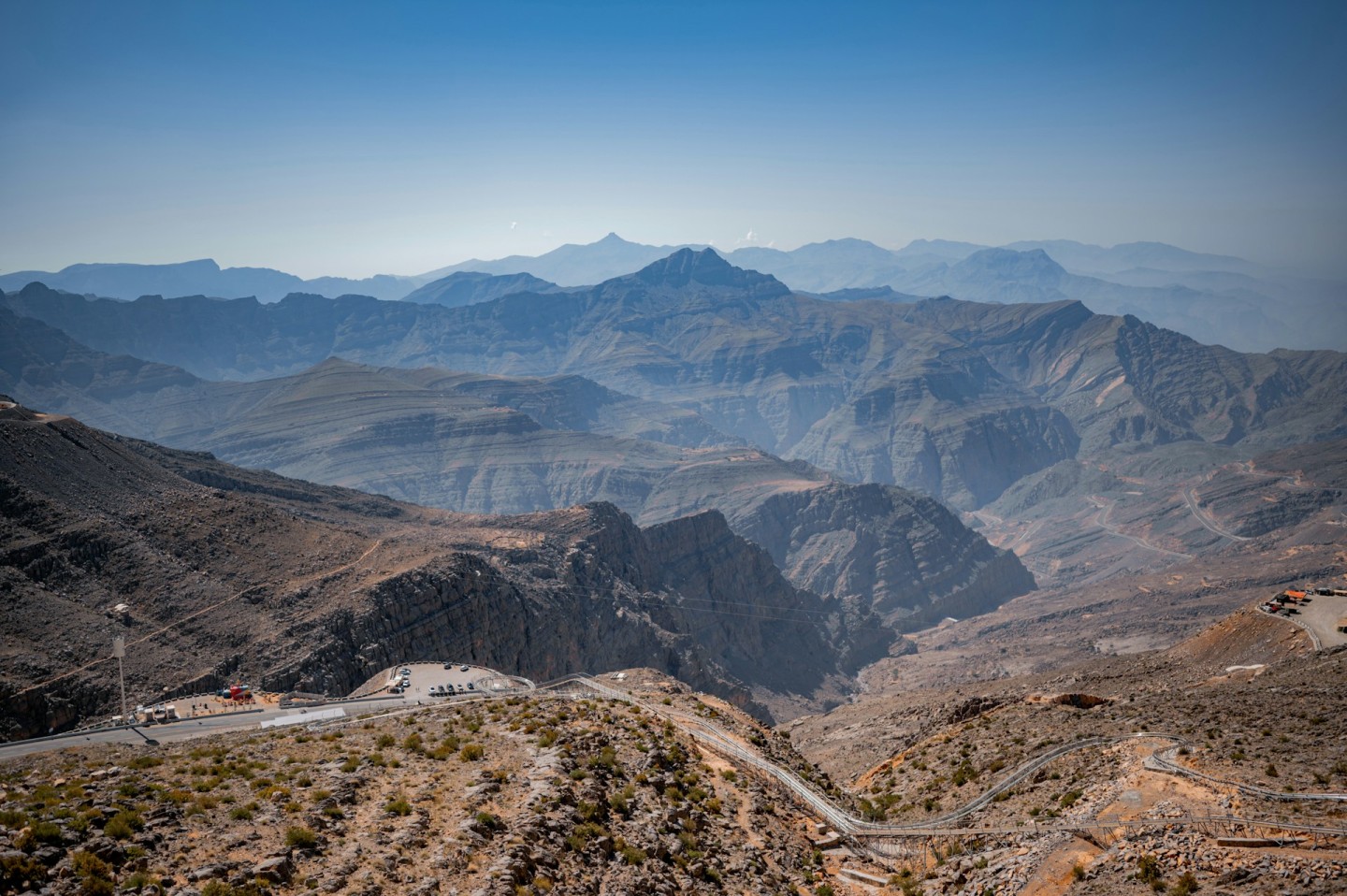 Road and rocky ridges seen from Jebel Jais in Ras Al Khaimah